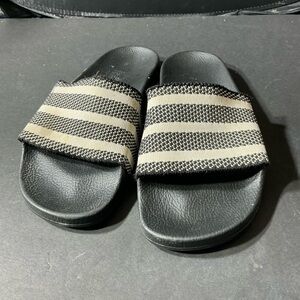 Black and white Adidas sandal